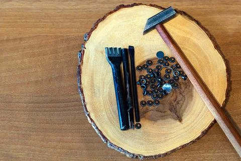 Eyelet Tool Set or Grommet Kit, Multi use punch Eyelet Tool with hammer for.. Stock Photos