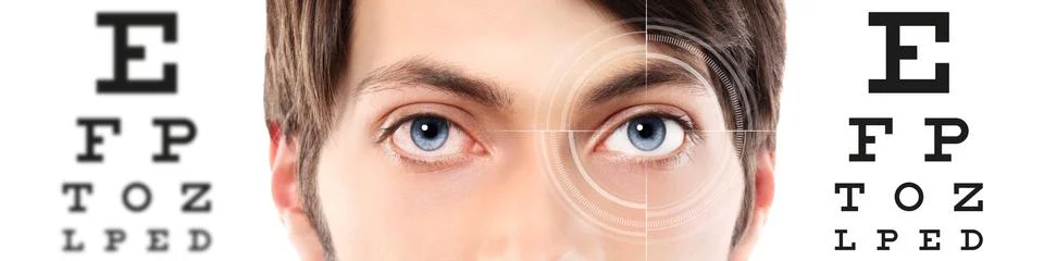 Eyes close up on visual test chart, eyesight and eye examination concept in w Foto stock