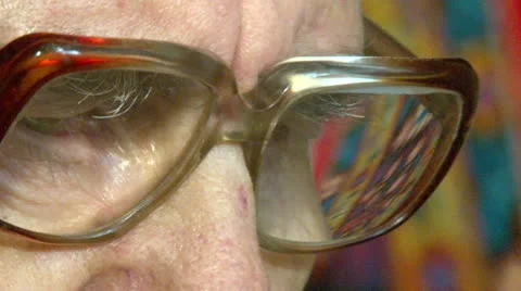 Eyes of an elderly man in glasses Video stock 25452288