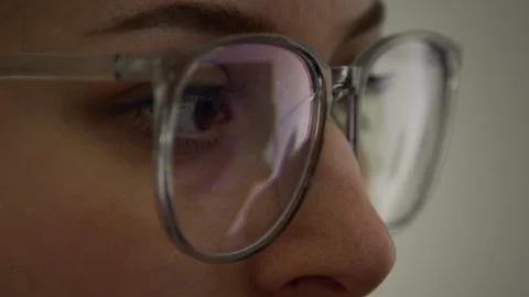 Eyes of Female Programmer in Glasses Working on Code Video stock 335936050