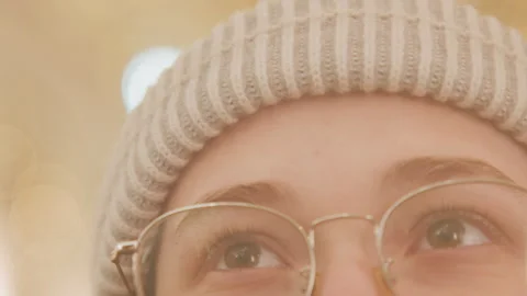 Eyes gently open. Silent gaze with soft background. Calm moment with blurred Stock Footage 342285180