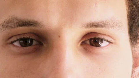 Eyes, optometry and face of man with vision, eyesight or optical health for Video stock 334699015