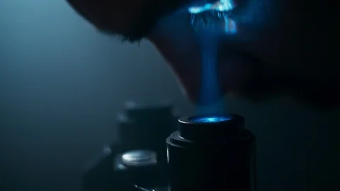 Eyes of scientist looking in microscope or scope in optical instrument. Shot  Stock Footage 105285815