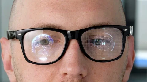 Eyes with virtual projections on 3d glasses lenses Stock Footage 90557792