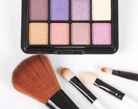 Eyeshadow and brushes Stock Photos