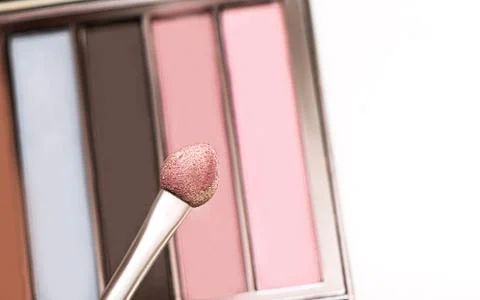 Eyeshadow on applicator, close up swatch. Stock Photos