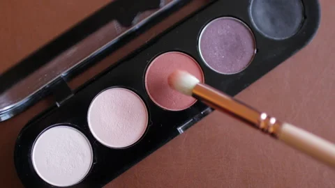 Eyeshadow palette with makeup brush Stock Footage 130190075