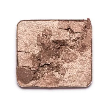 Eyeshadow sample isolated on white background. Crushed brown metallic eyeshad Foto stock