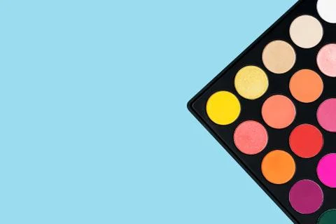 Eyeshadows on blue background Foto stock