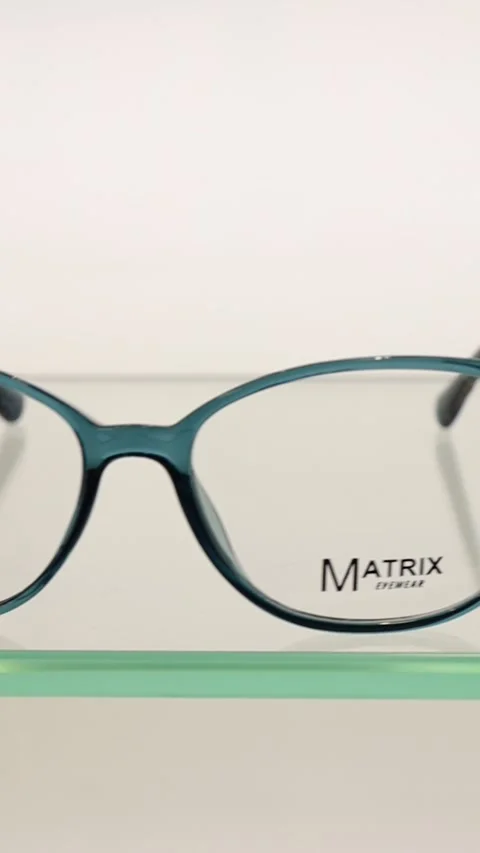 Eyewear accessory rectangular glasses on a glass shelf 库存影片 270428359