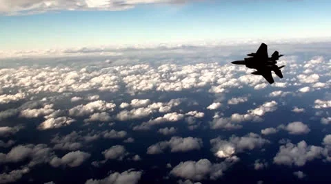 F-15 Eagle fighter jet above the clouds Видео 24856929