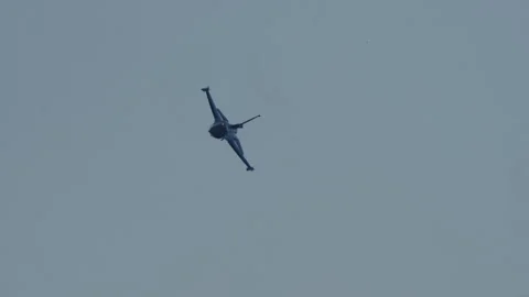 F-16 Fighter Jet in Slow Maneuver Stock Footage 329673637