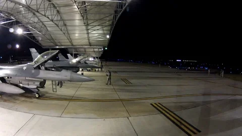 F-16 fighter jets go through a final mobility processing function - 2012 Video stock 104310956
