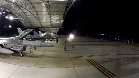 F-16 fighter jets go through a final mobility processing function - 2012 Stock Footage 104311030