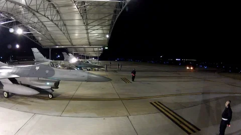 F-16 fighter jets moving on runway final mobility processing function - 2012 動画素材 104311305
