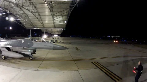 F-16 fighter jets moving on runway final mobility processing function - 2012 Video stock 104311405