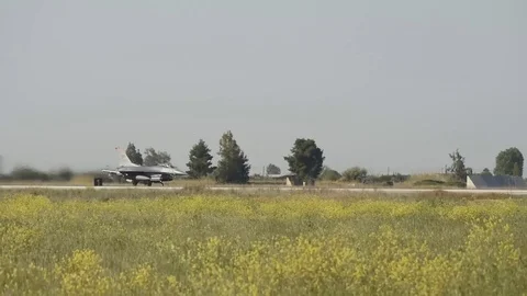 F-16 Fighting Falcon taking off with afterburner during exercise Iniochios Stock Footage 105715760