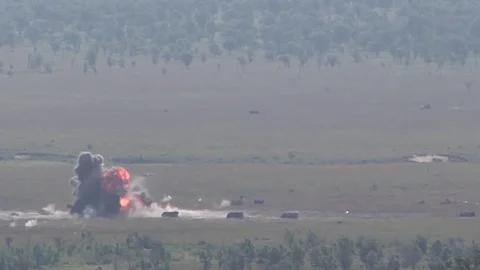 F-16 fires bomb causing explosion and black dust cloud Stock Footage 84722690