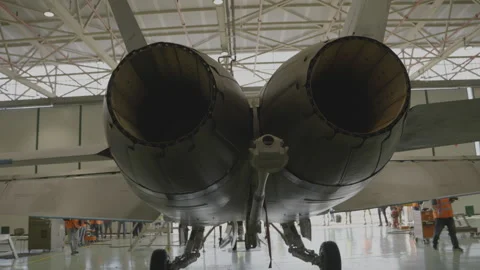 F-18 fighter jet twin engine nozzle close up in hangar Zaragoza Video stock 336465114