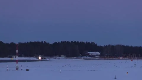 F/A-18 Hornet touching down at dusk in arctic environment Stock Footage 268206928