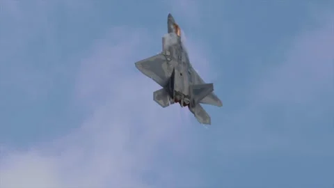 F-22 harrier pass high G Stealth Fighter Jet afterburners Supersonic Flight Stock-Footage 347654094