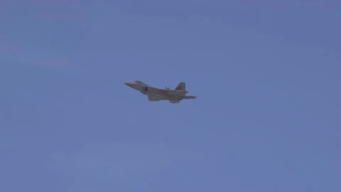 F-22 Raptor banking right with reheat Stock-Footage 150362059