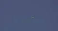F-22 Raptor clims high and rolls several times HD Footage