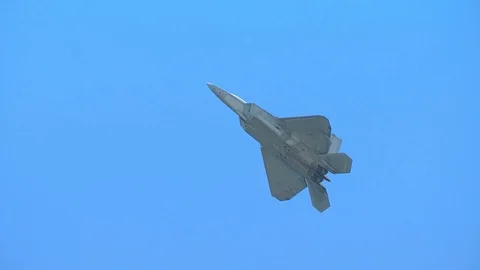 F-22 Raptor stealth fighter aircraft performs a very slow pass Stock Footage 91754928