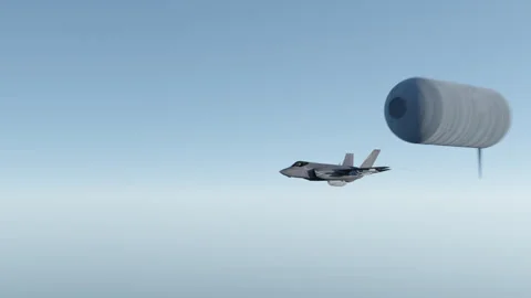 F-35 is approached by a UAP Stock Footage 247521563