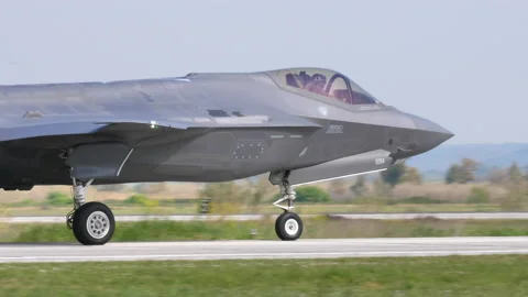 F-35 JSF Joint Strike Fighter stealth jet plane in a military air base Stock Footage 154953136