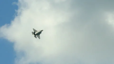 F-35 Lightning in a hard bank and climbing. Stock Footage 239365220