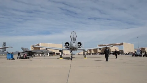 F-35 Lightning taxiing behind A-10 Thunderbolt II at Davis Monthan AFB Stock-Footage 104600853