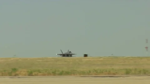 F-35 takeoff from airforce base in Utah.  Wider view of takeoff. Stock Footage 78390982