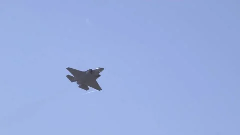 F-35A Lightning II leaves vapour trail while banking left  Stock Footage 150362140