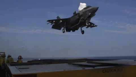 F-35B Lightning II conducts vertical landing aboard USS Wasp in Philippine Sea Vídeos de archivo 102768959