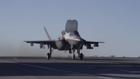 F-35B Lightning launches from ramp aboard Royal Navy HMS Prince of Wales (R09) Stock Footage 259036254