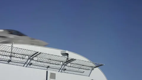 F-35B Lightning takes off from ski slope aboard HMS Queen Elizabeth Stock Footage 98927706