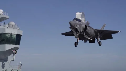 F-35B Lightning vertical landing aboard Royal Navy HMS Prince of Wales (R09) Stock Footage 259035784