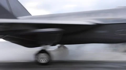 F-35C Lightning II launching infront of blast deflector on USS George Washington Stock Footage 258898029