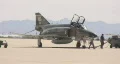 F-4 Phantom jet on tarmac being serviced and prepped. HD Footage