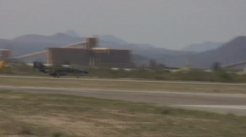 F-4 Phantom landing with parachute deployed Stock Footage 341376