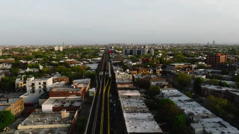 F Train Passing Through Midwood Brooklyn – April 29 Aerial View Stock Footage 309490945