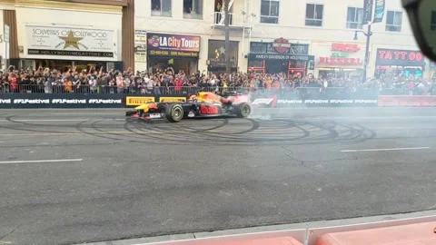 F1 car on Hollywood blvd Stock Footage 149899341