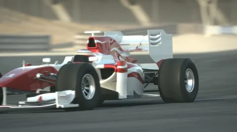 F1 race car on desert circuit Stock Footage