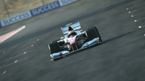 F1 race car on desert circuit - finish line Stock Footage