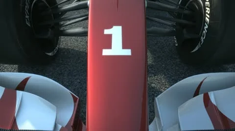 F1 race car at start position accelerating Stock Footage