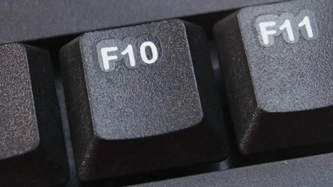 F10 Key on Desktop Keyboard Pressed by Finger Hand Multiple Times - Close Up Stock Footage 290471165