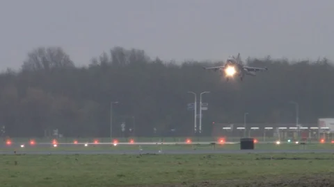 F16 Fighter Jet touchdown Stock Footage 103989606