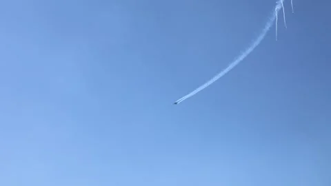 The F16 fighter performs aerobatics over the sea against the background of Video stock 308151238