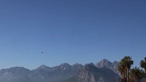 The F16 fighter performs aerobatics over the sea against the background of Stockbeeldmateriaal 308152009